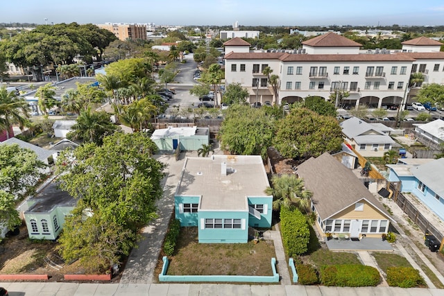 birds eye view of property with a residential view