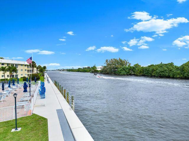 property view of water with fence