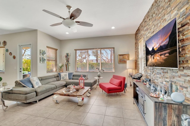 living area with light tile patterned floors, recessed lighting, and ceiling fan