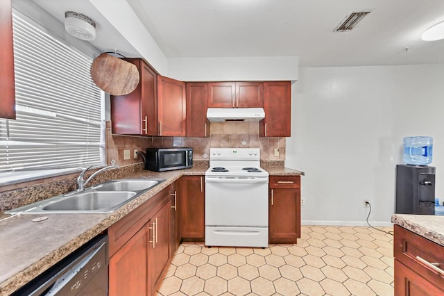 kitchen with white electric range, stainless steel microwave, under cabinet range hood, black dishwasher, and a sink