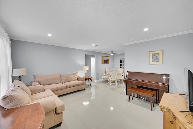 living area with light tile patterned floors, baseboards, a ceiling fan, and recessed lighting