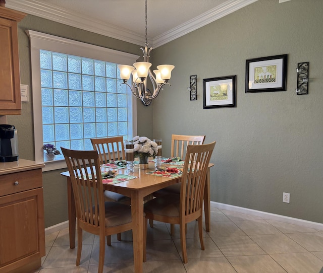 dining space with a chandelier, crown molding, baseboards, and light tile patterned flooring