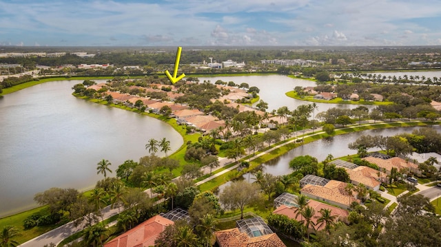 drone / aerial view with a water view