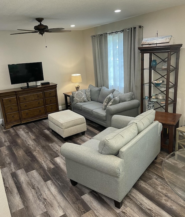 living area with recessed lighting, baseboards, wood finished floors, and ceiling fan