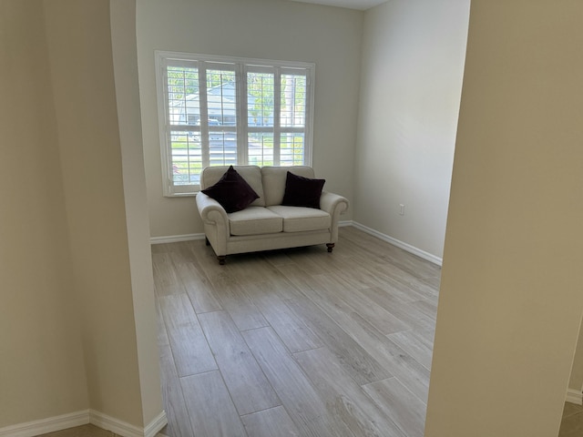 560 SW Indian Key Dr S, Saint Lucie West, FL 34986 - sitting room featuring baseboards and wood finished floors