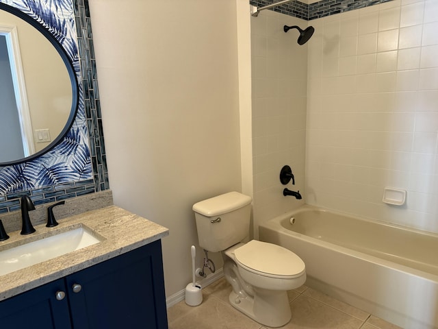 bathroom with tile patterned floors, shower / bath combination, toilet, and vanity