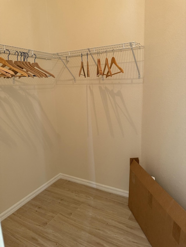 560 SW Indian Key Dr S, Saint Lucie West, FL 34986 - spacious closet featuring light wood-style flooring