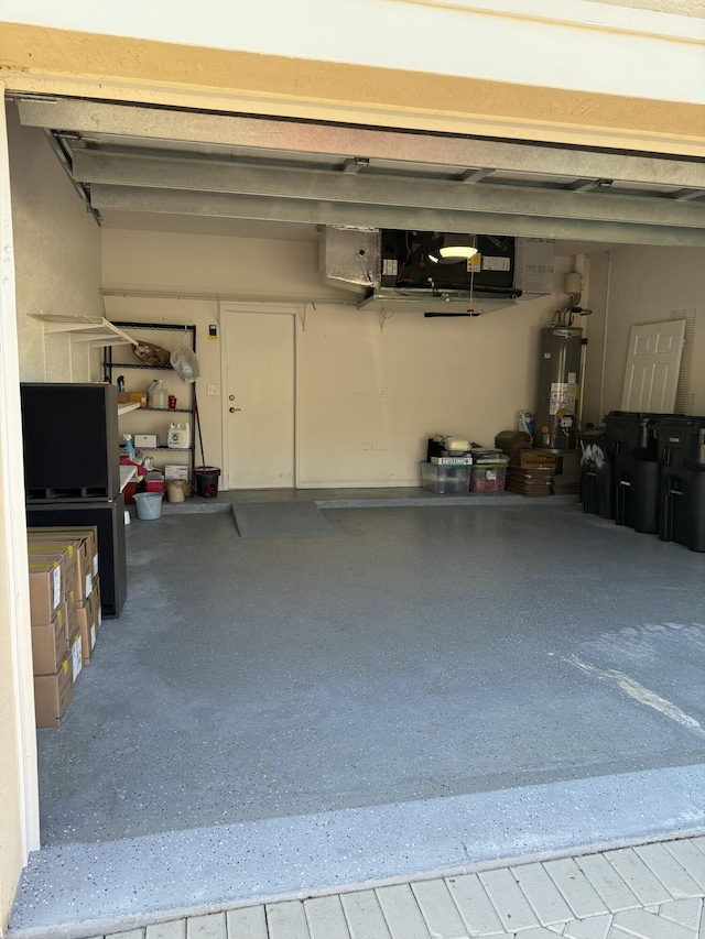 garage featuring gas water heater