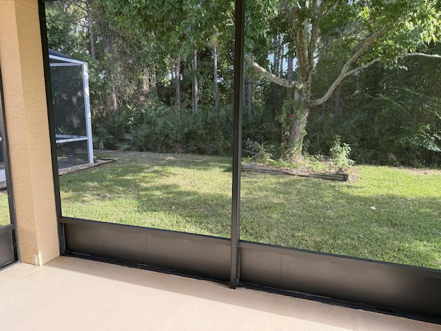 560 SW Indian Key Dr S, Saint Lucie West, FL 34986 - view of yard with glass enclosure