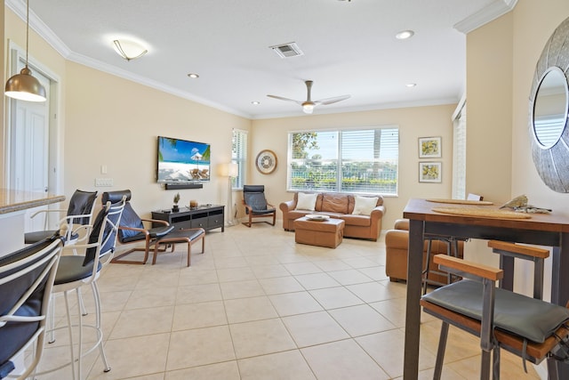 living area with visible vents, ornamental molding, light tile patterned floors, recessed lighting, and a ceiling fan