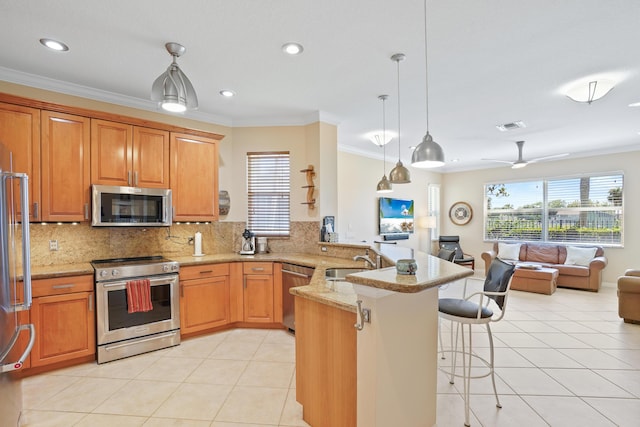 kitchen with visible vents, a peninsula, light tile patterned flooring, appliances with stainless steel finishes, and open floor plan