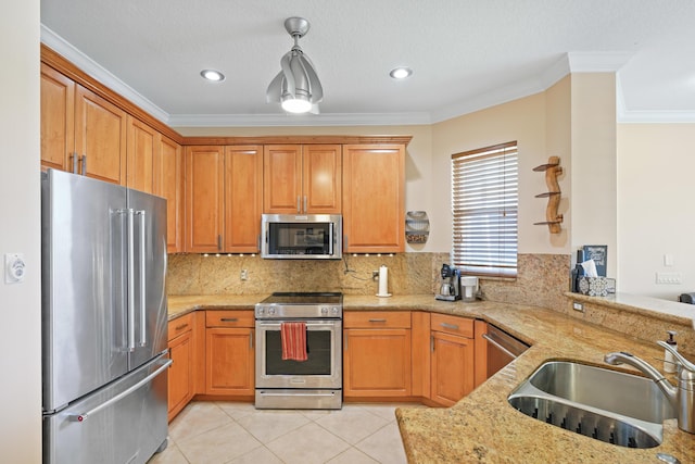 kitchen featuring ornamental molding, a sink, stainless steel appliances, light tile patterned floors, and light stone countertops