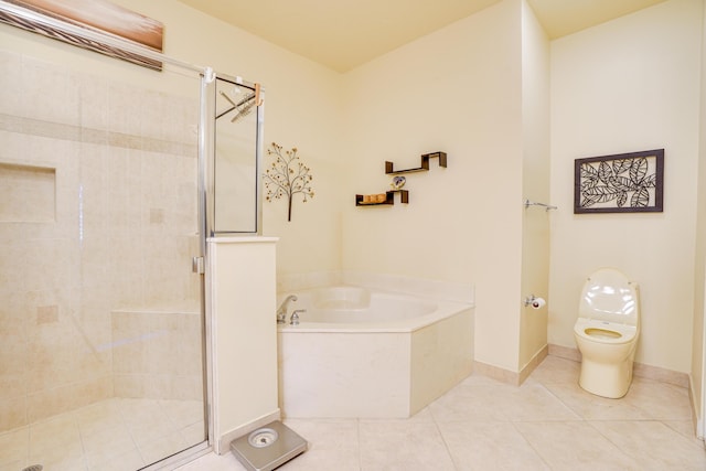 full bath with toilet, a shower stall, tile patterned flooring, baseboards, and a bath