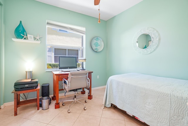 bedroom featuring tile patterned floors, ceiling fan, and baseboards