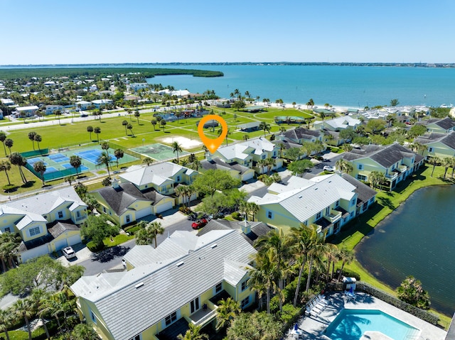 aerial view with a residential view and a water view