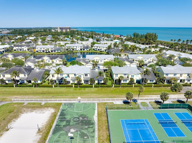 aerial view with a residential view and a water view