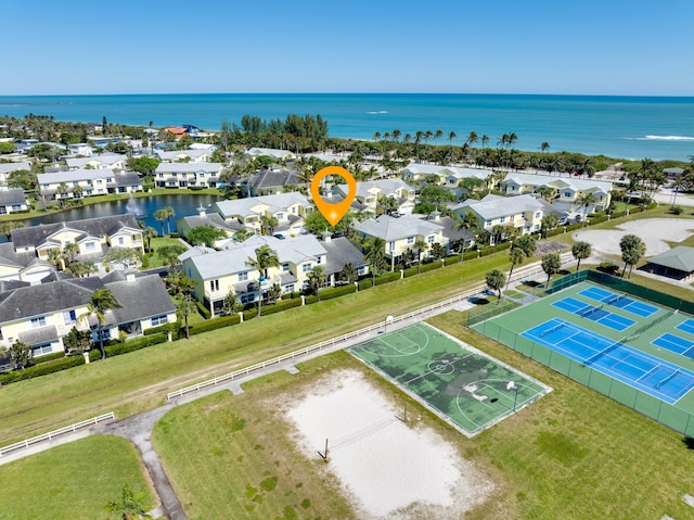 aerial view featuring a residential view and a water view