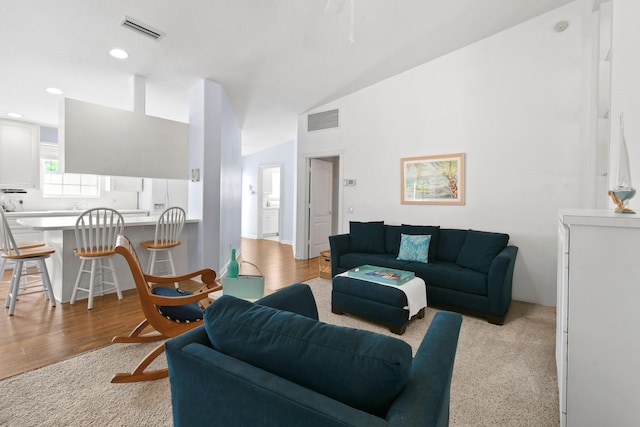 2853 White Trout Ln, West Palm Beach, FL 33411 - living area featuring lofted ceiling, light wood-type flooring, and recessed lighting
