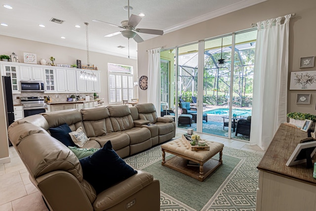 living area with visible vents, ceiling fan, ornamental molding, recessed lighting, and a sunroom