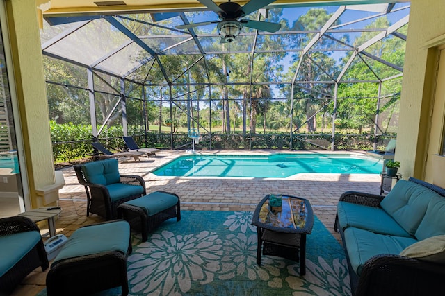 pool featuring a patio area, a lanai, and outdoor lounge area