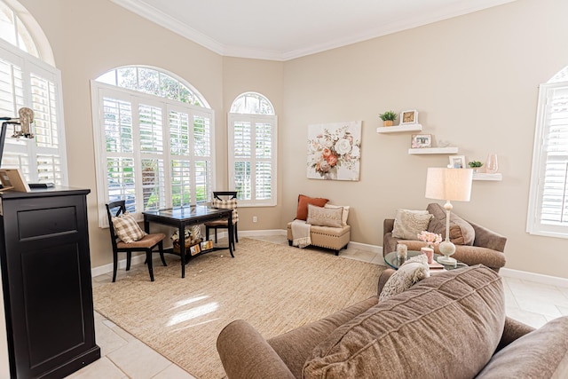 living area with baseboards, light tile patterned flooring, and crown molding