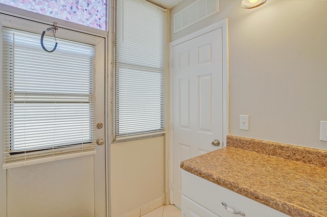 406 Flanders I, Delray Beach, FL 33484 - doorway to outside featuring light tile patterned floors