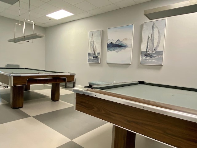 recreation room featuring tile patterned floors, a drop ceiling, and pool table