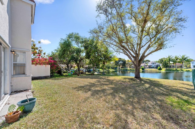 view of yard with a water view