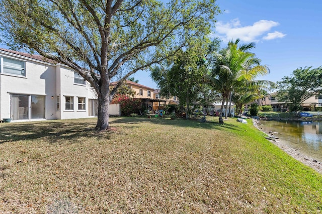 view of yard with a water view