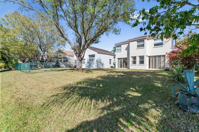 view of yard with fence