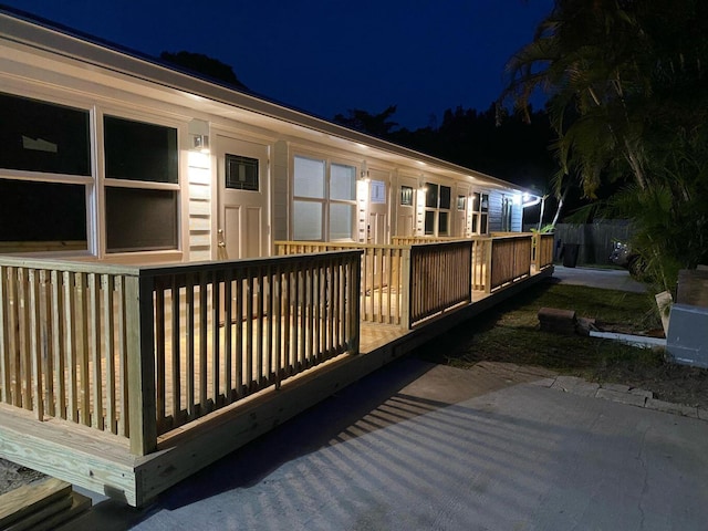 view of deck at twilight