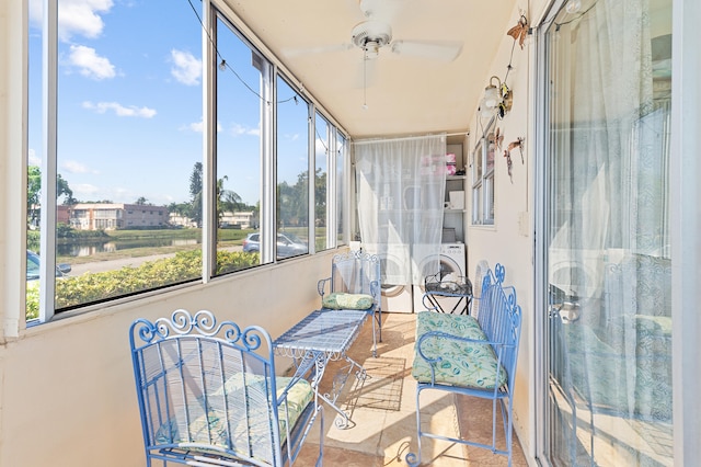 sunroom with a ceiling fan