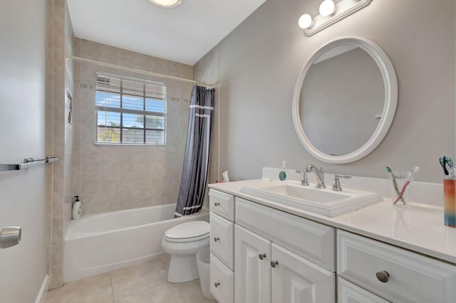 full bath with toilet, tile patterned floors, shower / bath combination with curtain, and vanity