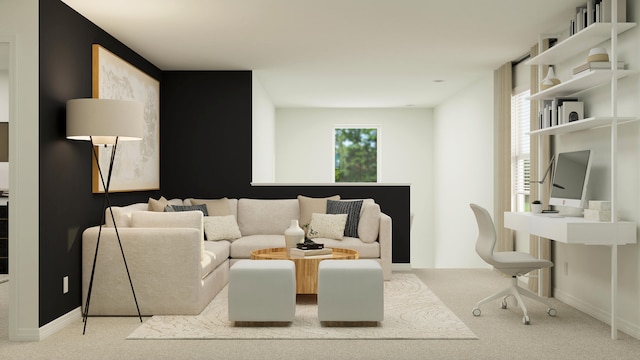 living room featuring carpet flooring and baseboards