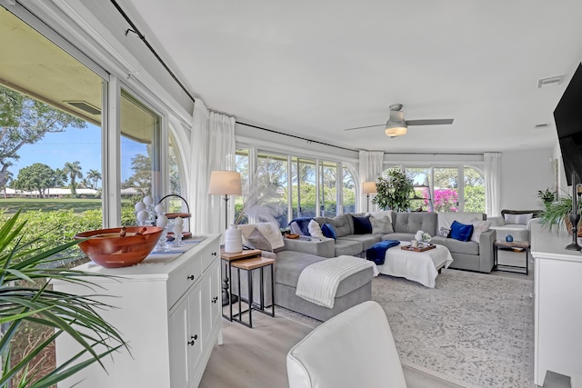 interior space featuring wood finished floors and a wealth of natural light