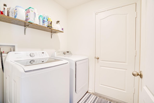 washroom with laundry area and washer and clothes dryer