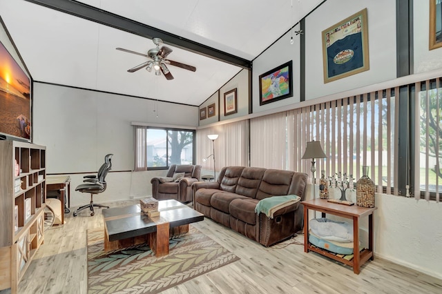 living room featuring beamed ceiling, high vaulted ceiling, wood finished floors, and a ceiling fan