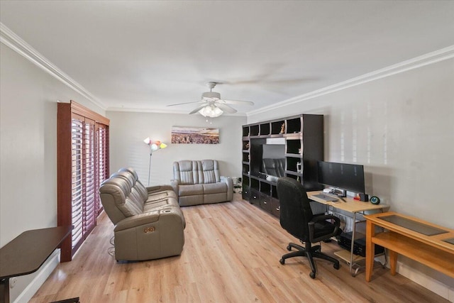 office featuring a ceiling fan, crown molding, and wood finished floors