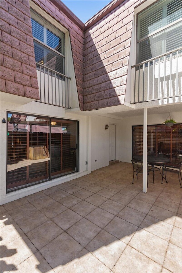 view of patio / terrace with a balcony