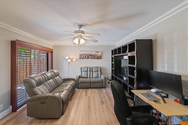 living room featuring ceiling fan, baseboards, wood finished floors, and ornamental molding