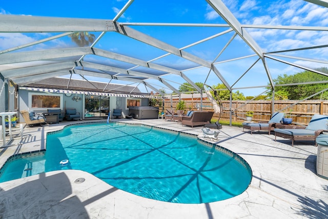 view of swimming pool featuring a fenced backyard, a patio area, a fenced in pool, an outdoor hangout area, and a hot tub