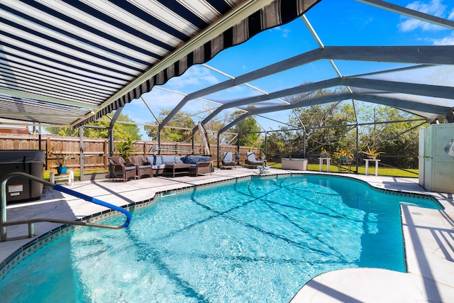 view of swimming pool with glass enclosure, a fenced in pool, a fenced backyard, outdoor lounge area, and a patio area