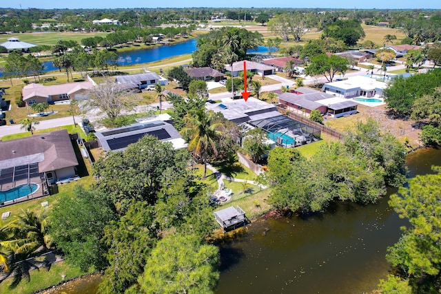 aerial view with a residential view and a water view