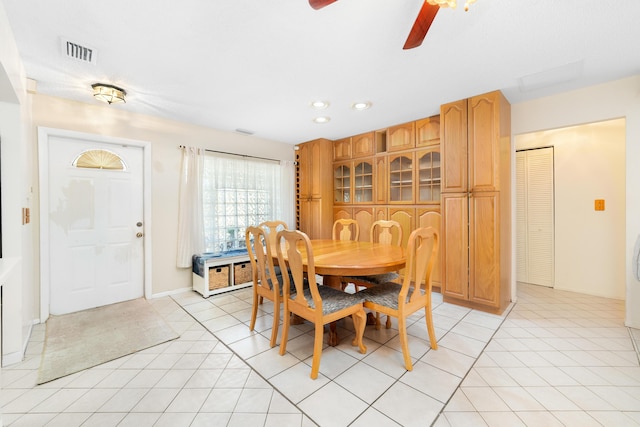 dining room with light tile patterned floors, visible vents, recessed lighting, and a ceiling fan