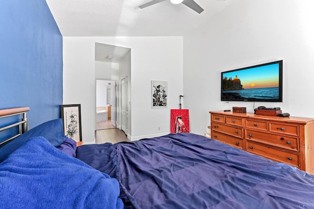 5822 Saddle Trail Ln, Lake Worth, FL 33449 - bedroom featuring wood finished floors, connected bathroom, and ceiling fan