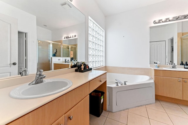 5822 Saddle Trail Ln, Lake Worth, FL 33449 - bathroom with tile patterned floors, a shower stall, a bath, and vanity