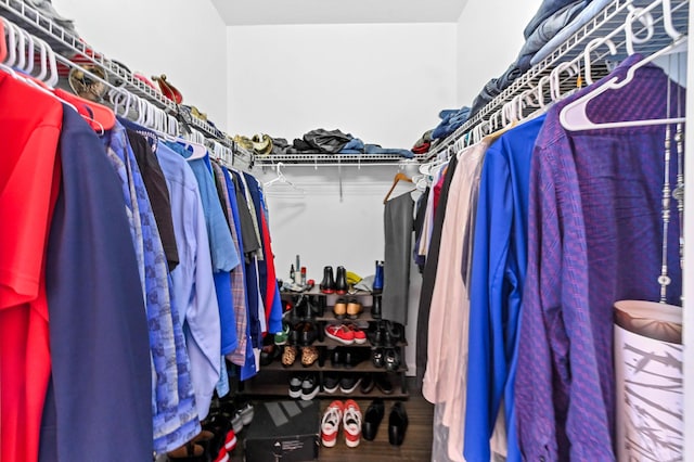 5822 Saddle Trail Ln, Lake Worth, FL 33449 - spacious closet featuring wood finished floors