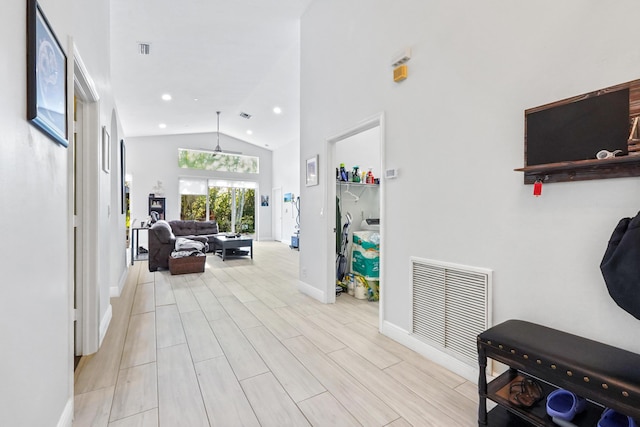 5822 Saddle Trail Ln, Lake Worth, FL 33449 - corridor with high vaulted ceiling and recessed lighting