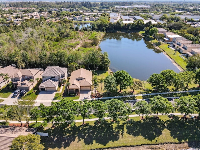 aerial view with a residential view and a water view