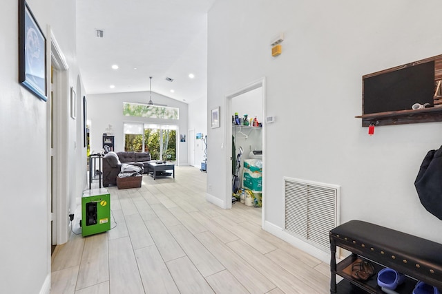 interior space featuring wood finish floors, visible vents, baseboards, and recessed lighting